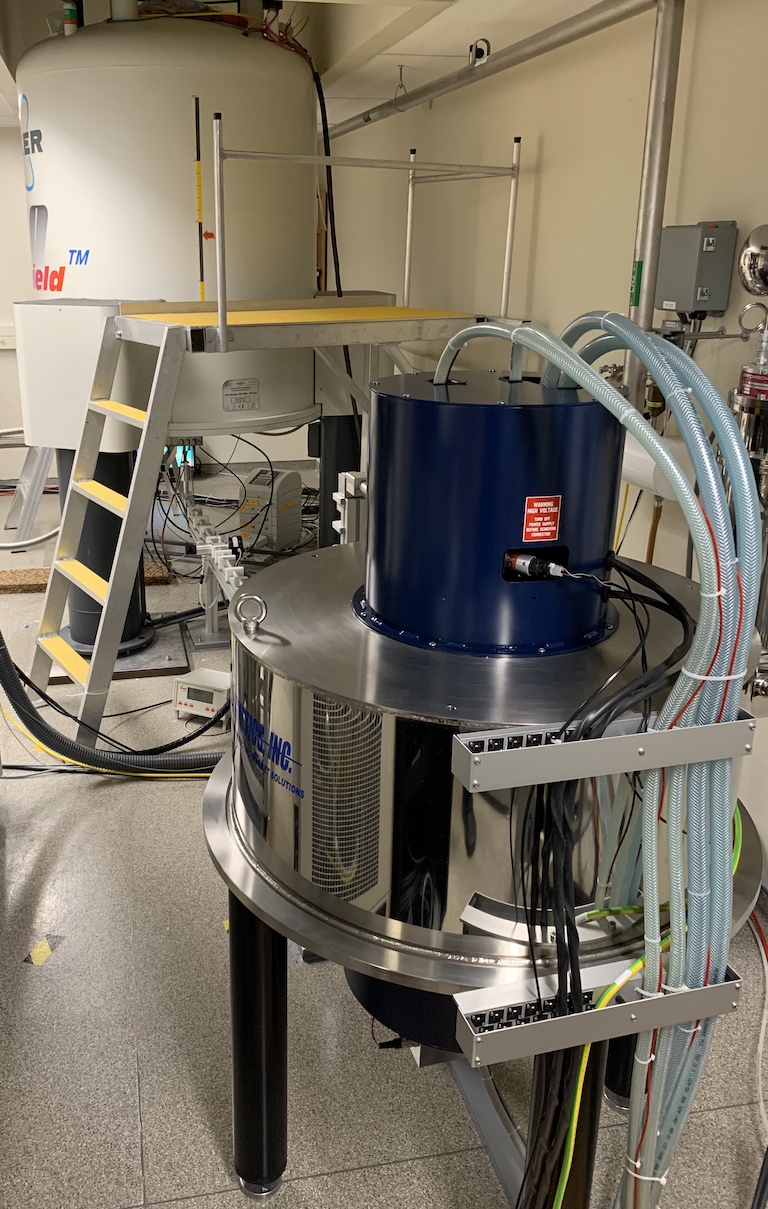 Dynamic Nuclear Polarization (DNP) NMR spectrometer DNP system with gryotron magnet in foreground and NMR magnet in background.