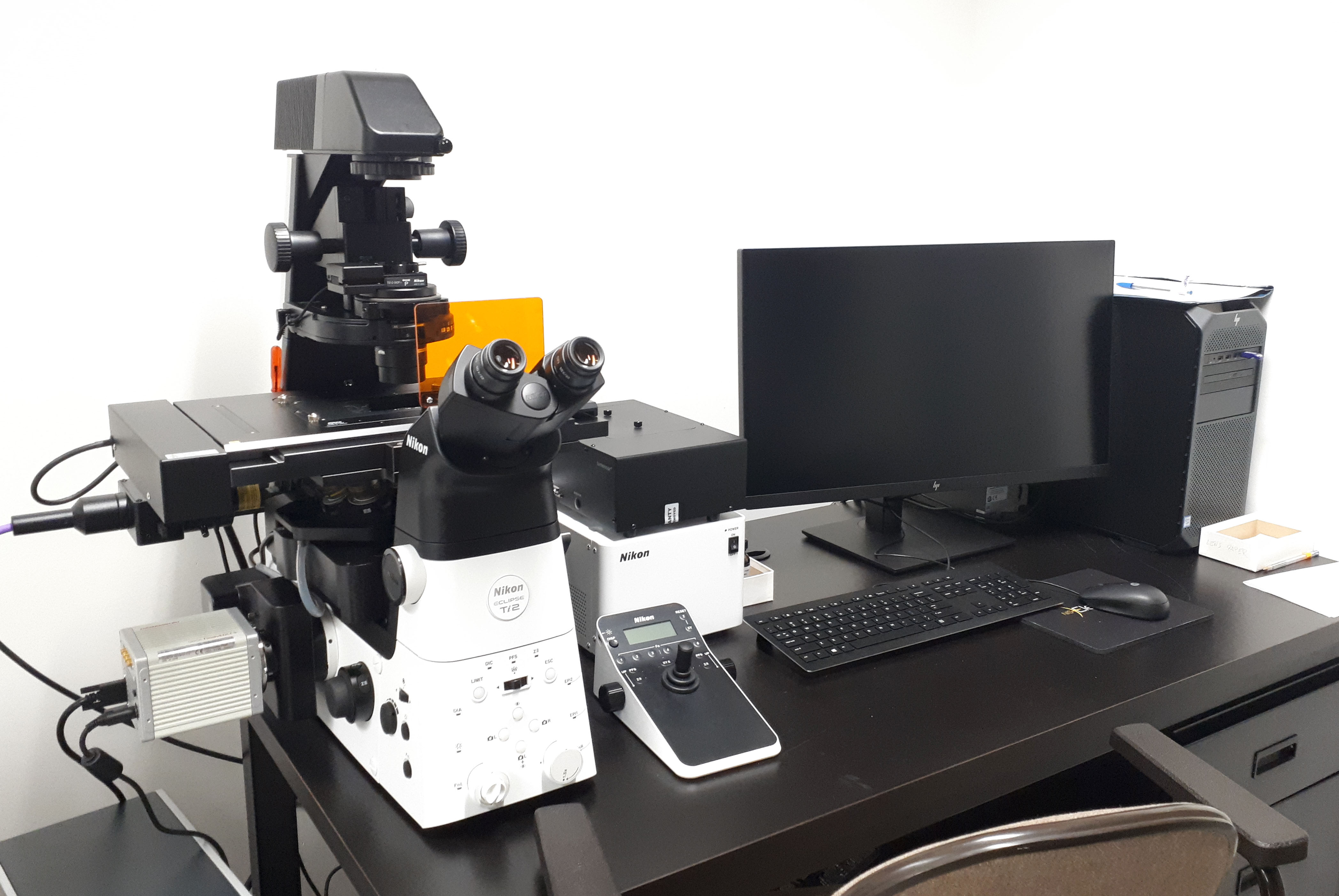 Nikon Eclipse Ti2 inverted microscope A picture of the Nikon Eclipse Ti2 inverted microscope with accessory equipment and computer