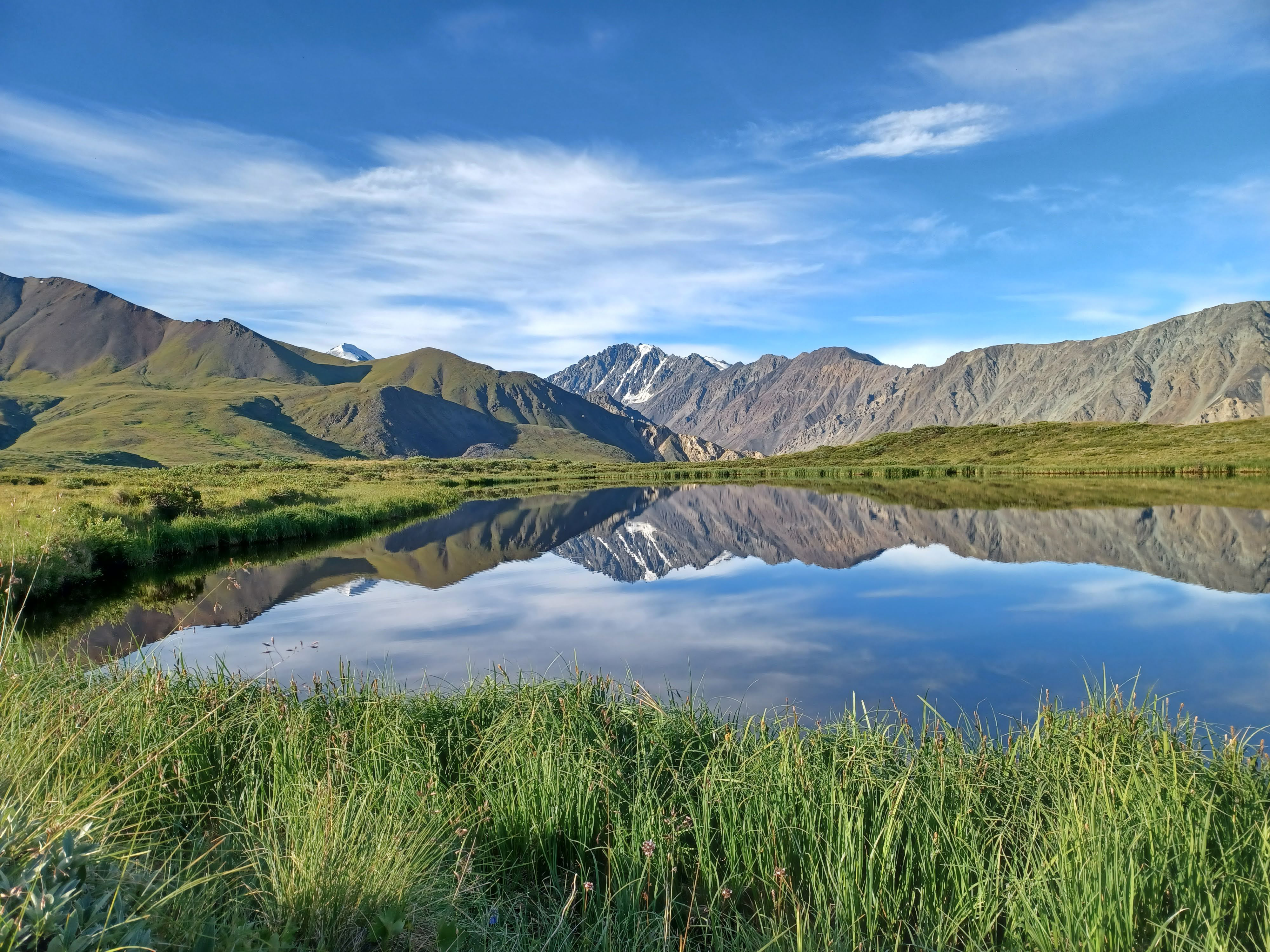 Mountains in the distance with a lake in front