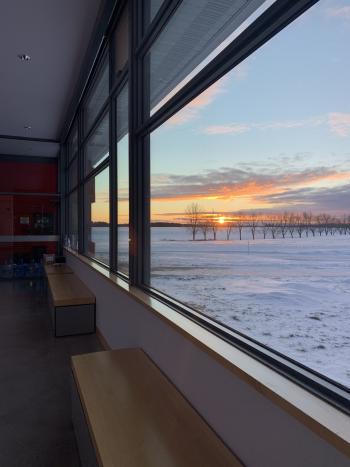 A sunset through a classroom window